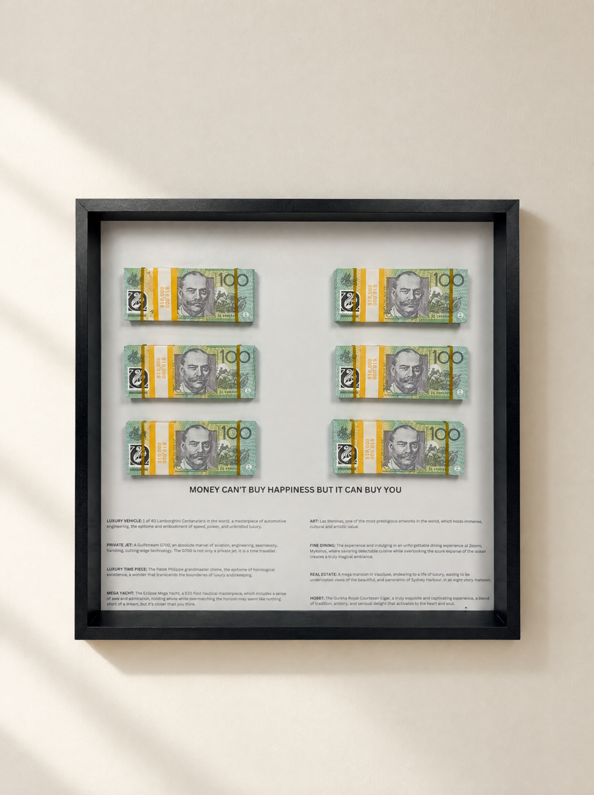 Money Can't Buy Happiness frame in white displayed in a gallery setting – Uhoh Studio